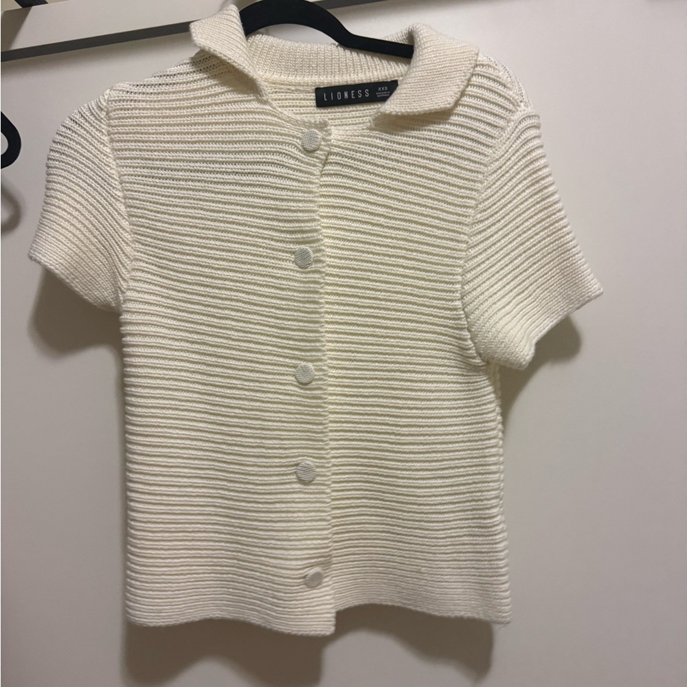 Lioness knit polo